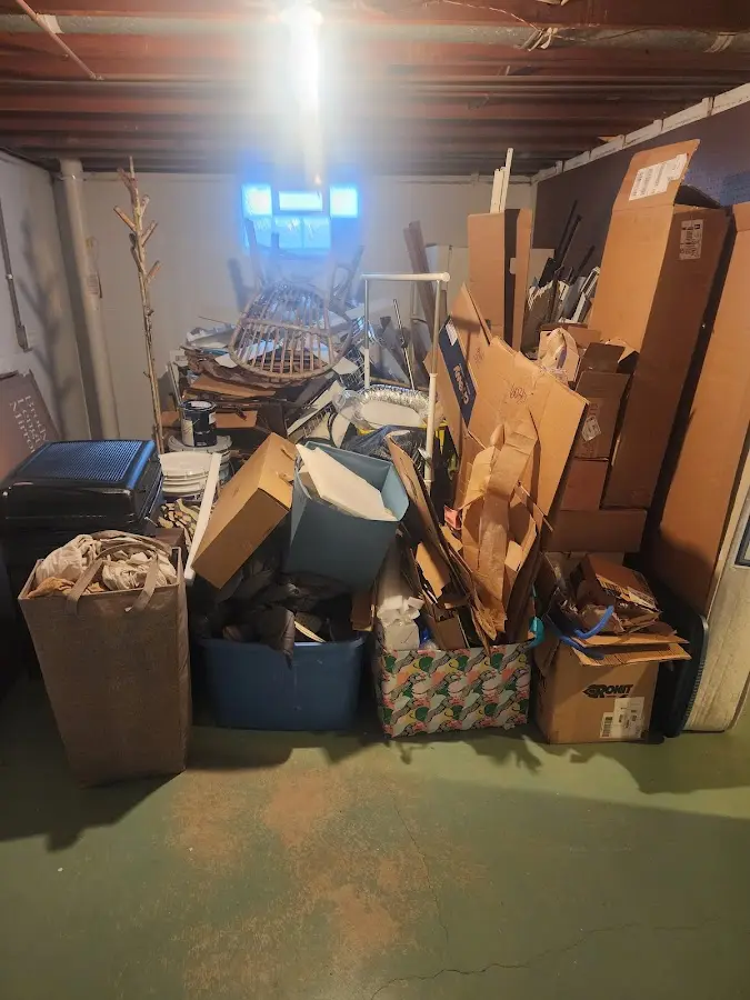 Roll-off dumpster container at job site for 6 Yard Dumpster Rental in Cortez